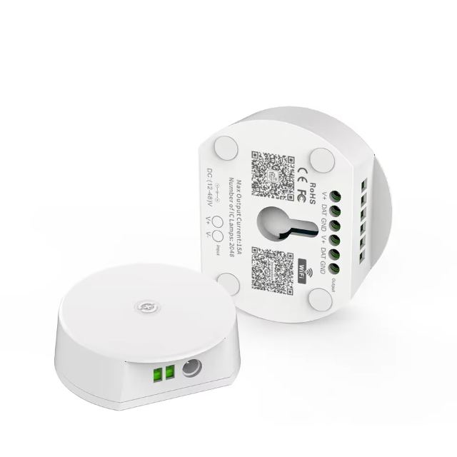 The Surplife controller shown from both sides: a small white disc and the reverse carrying its terminals and QR code