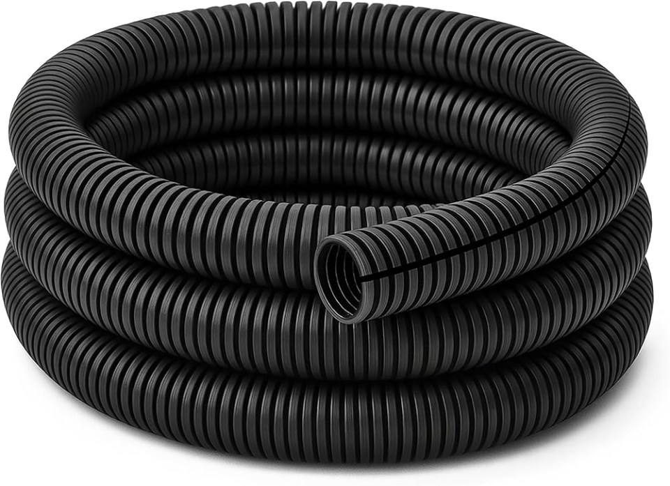 A coil of black split loom tubing, slit along its length to close over a cable run