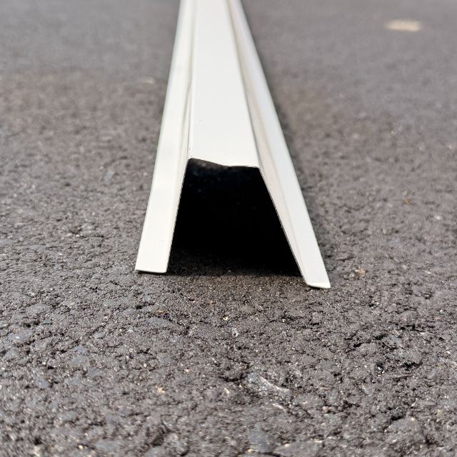 The same commercial track viewed end-on, showing the depth of the channel the lights seat into