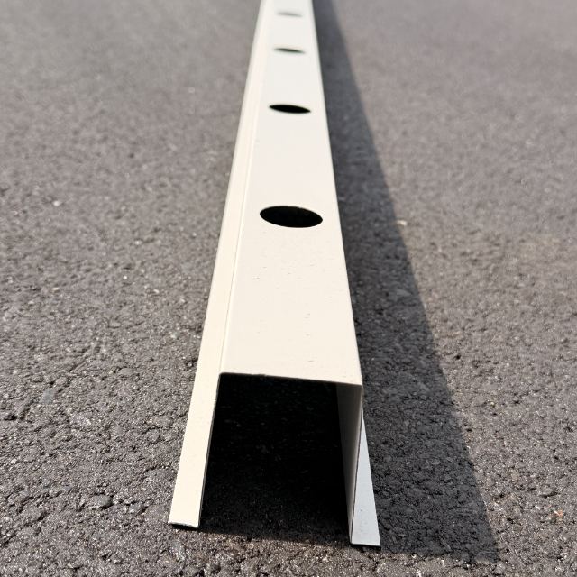 The 3-inch deep hat track in white aluminum, seen end-on so the deeper channel is visible
