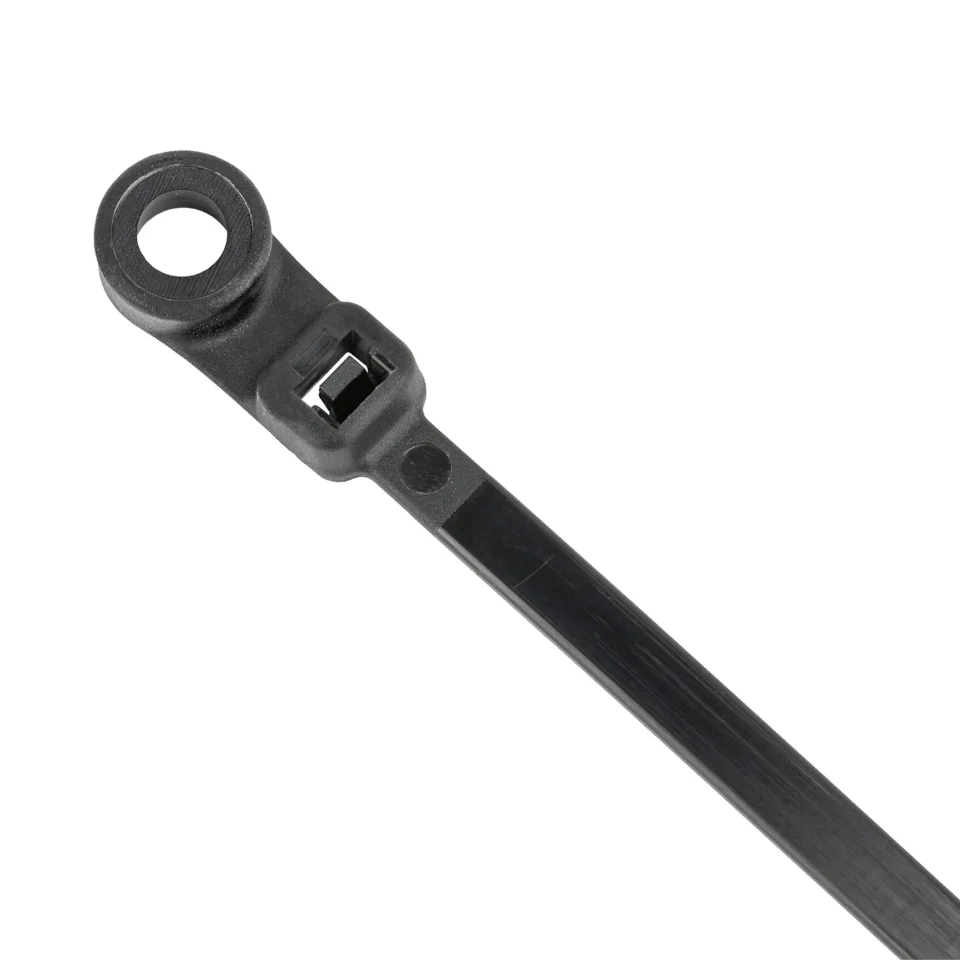 An eight-inch white zip tie laid beside a tape measure showing its length